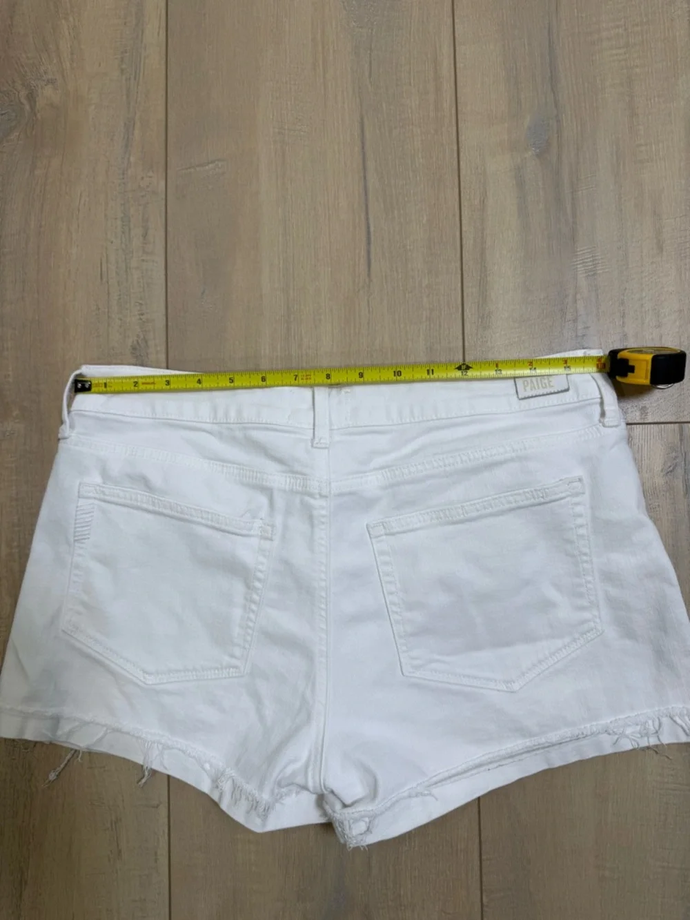 PAIGE White Denim Frayed Hem Shorts